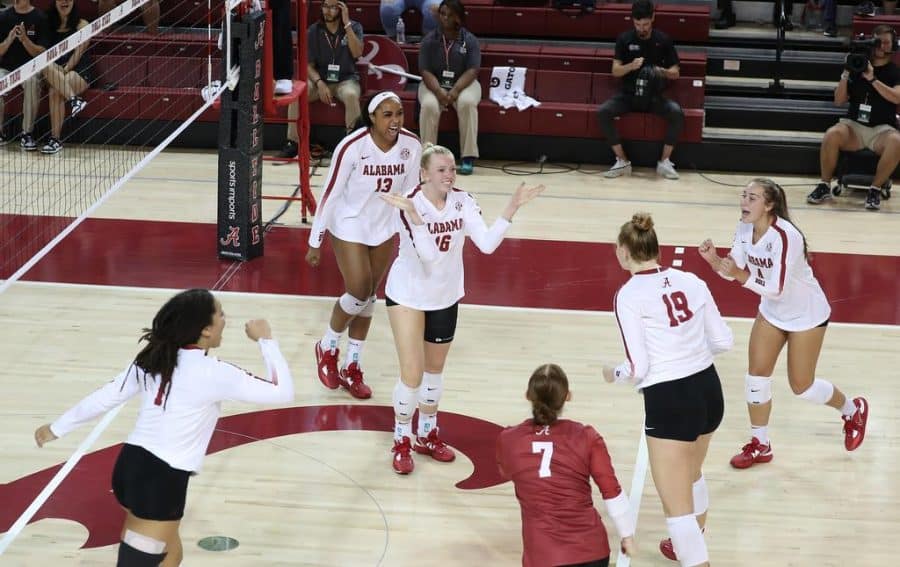 Alabama volleyball setter Brooke Slusser (16) celebrates with her teammates in the Crimson Tides victory over the UTSA Roadrunners on Aug. 26 at Foster Auditorium in Tuscaloosa, Ala.