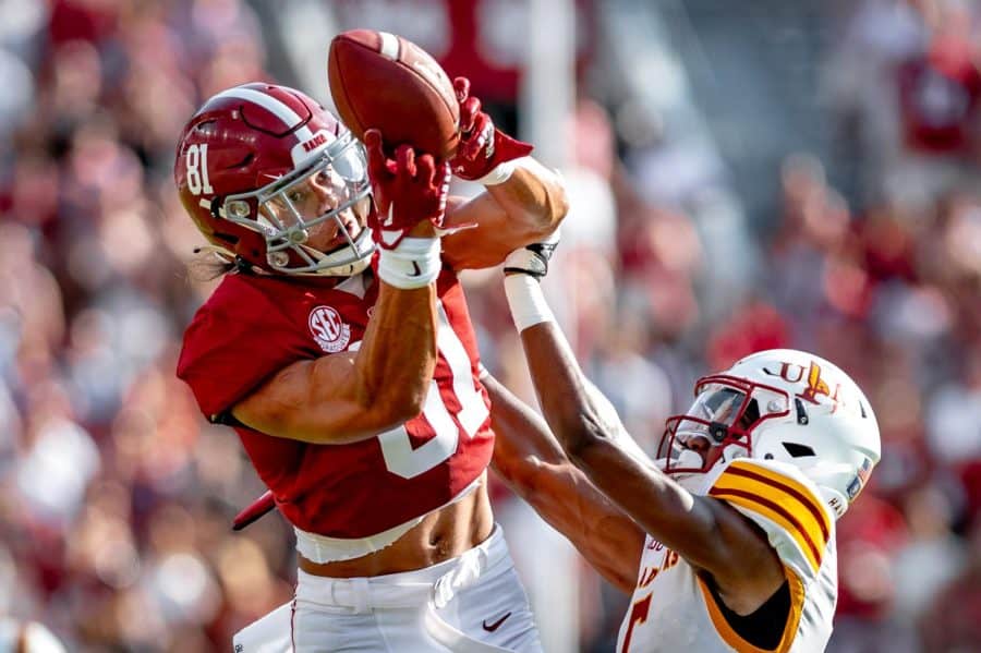 Alabama tight end Cameron Latu (81) makes a catch over his defender for a 38-yard gain versus the UL Monroe Warhawks on Sept. 17 at Bryant-Denny Stadium in Tuscaloosa, Ala.