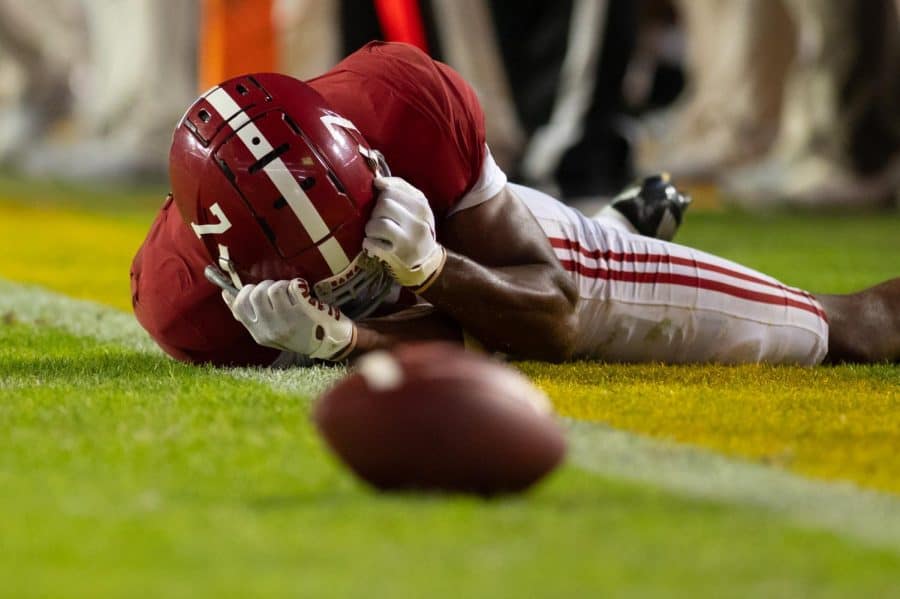 Alabama wide receiver Ja’Corey Brooks (7) lays on the ground in frustration after an incompletion in the Crimson Tide’s 32-31 overtime loss to the No. 10 LSU Tigers on Nov. 5 at Tiger Stadium in Baton Rouge, La.
