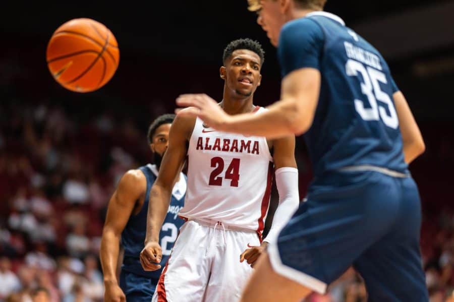 Alabama guard Brandon Miller looks at his opponent in the Crimson Tides 75-54 victory over the Longwood Lancers on Nov. 7 at Coleman Coliseum in Tuscaloosa, Ala.