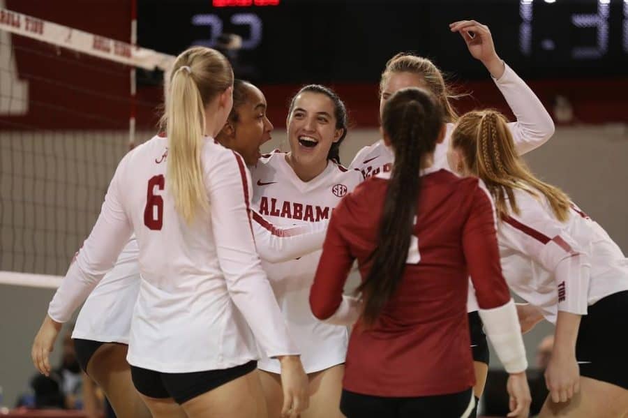 The Alabama volleyball team celebrates in the Crimson Tides three-set win over the South Carolina Gamecocks on Nov. 12 at Foster Auditorium in Tuscaloosa, Ala.