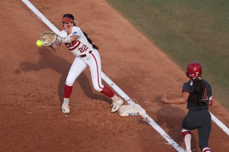 Alabama softball player Kali Heivilin (#22) makes a play at first base against Stanford on June 2 at USA Softball Hall of Fame Stadium in Oklahoma City, OK