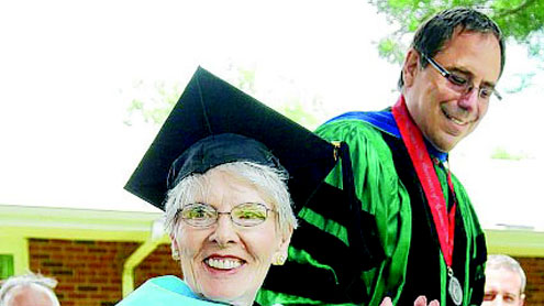 UA alum receives doctoral hood after 32 years