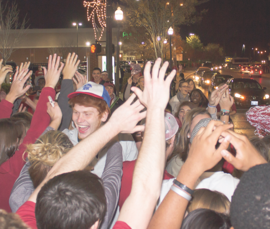 Tide fans celebrate on the Strip after Baylors victory over Kansas State in overtime Saturday