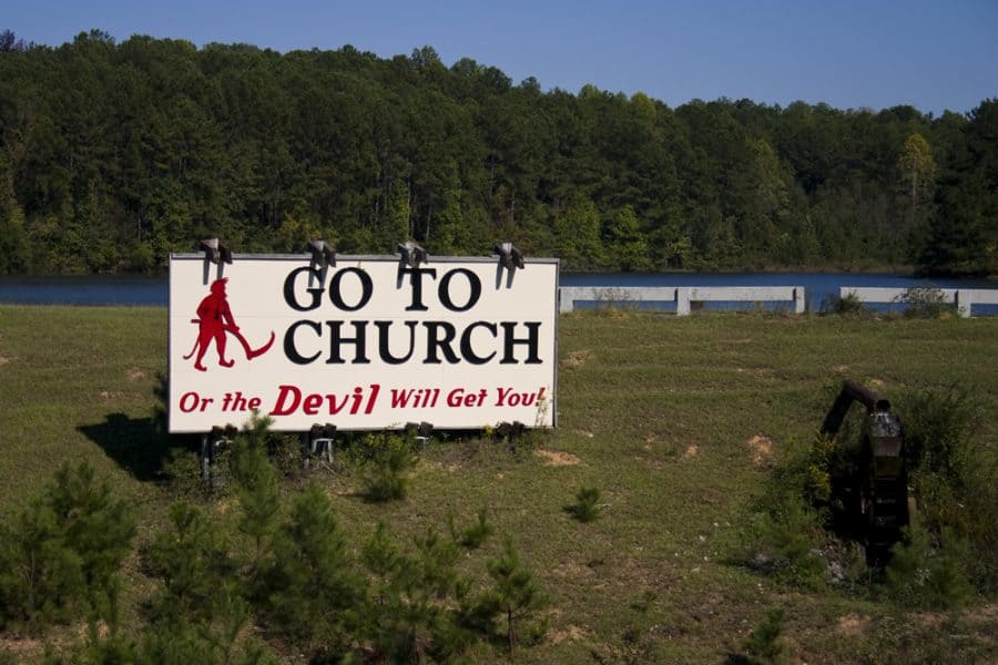 Roadside signs maintain old south stigmas