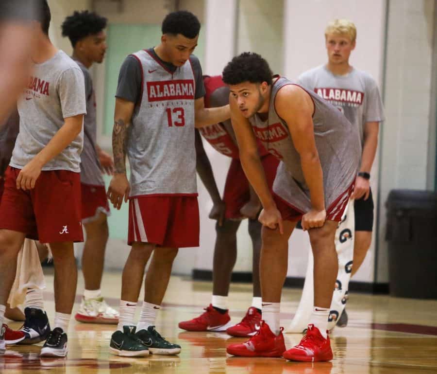 Jahvon Quinerly (No. 13) stands next to teammate Alex Reese during a practice on Sept. 24, 2019. (CW / Joe Will Field)