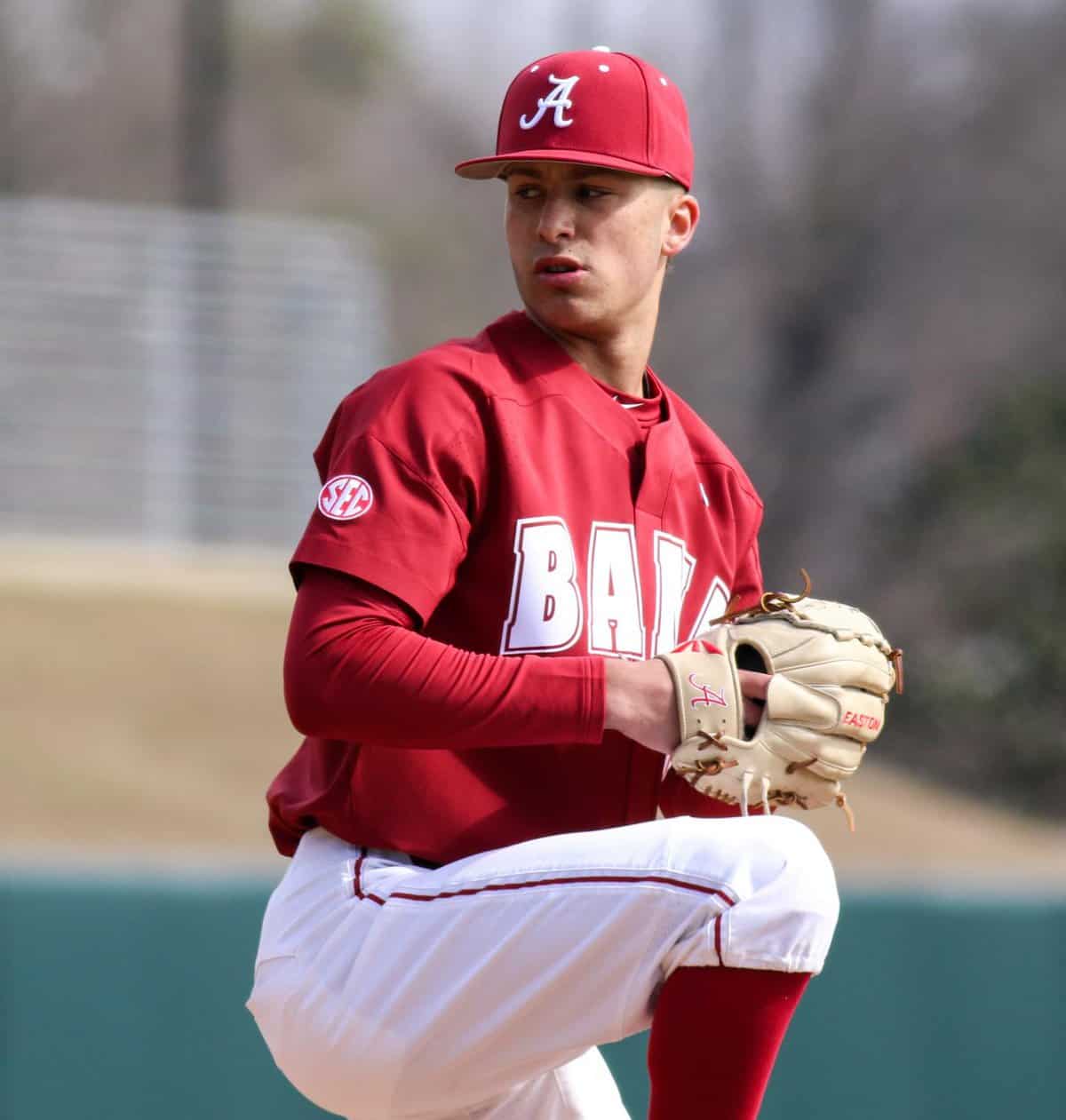 Alabama Owen Diodati (16) runs to first during an NCAA baseball