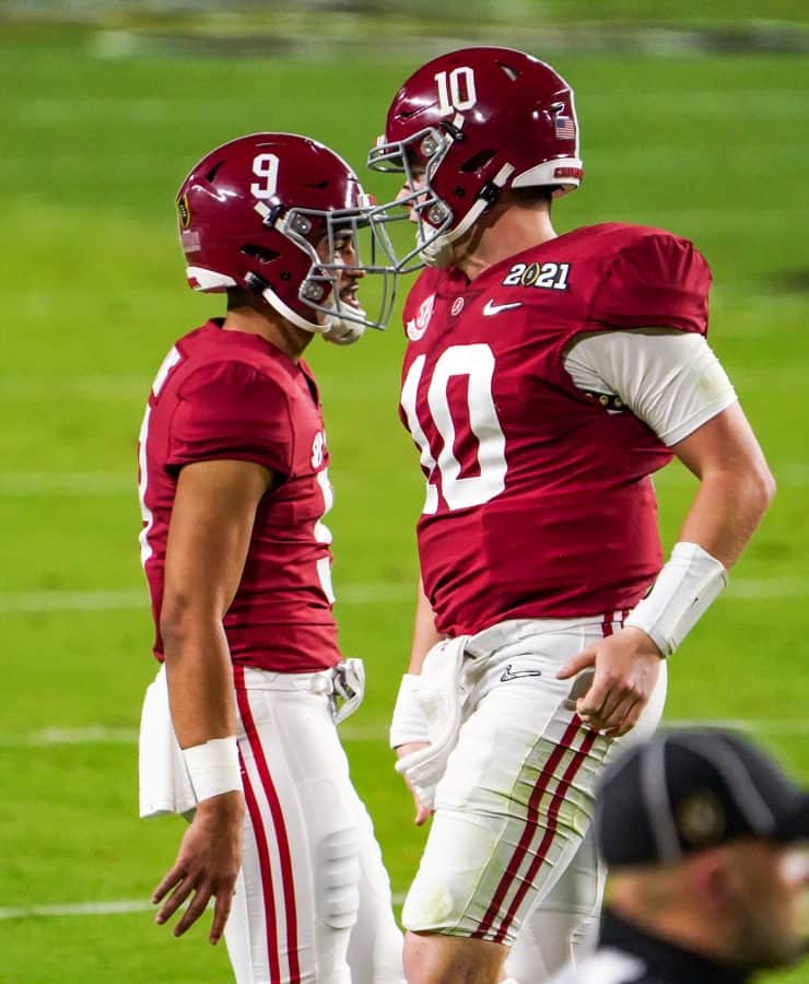 Mac Jones passes the torch to freshman Bryce Young during the College Football Playoff National Championship on Jan. 11.