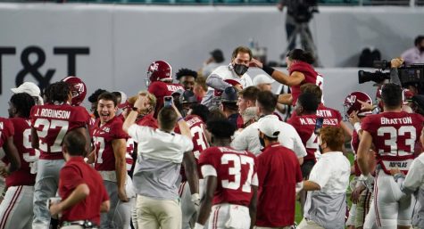 Nick Saban gets carried off the field after Alabama clinched its 18th National Championship title.