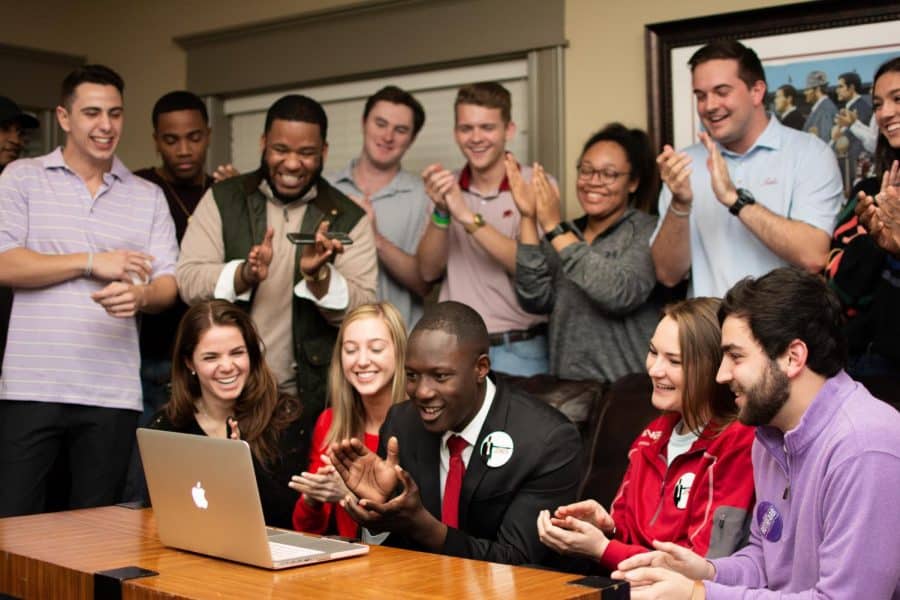 Last spring, now-SGA President Demarcus Joiner celebrated his win with his team. 