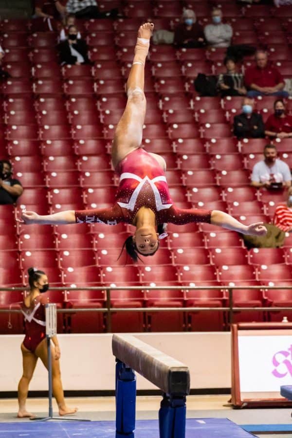 Freshman Shania Adams goes through her beam routine just after scoring a career high on the uneven bars.