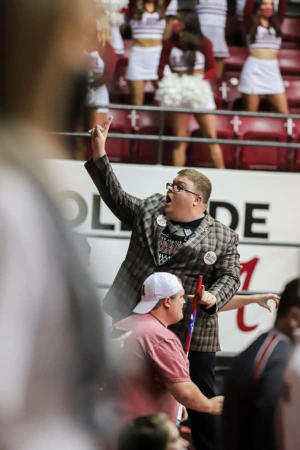 Pictured in his legendary blazer, Ratliff leads the crowd in a chant.