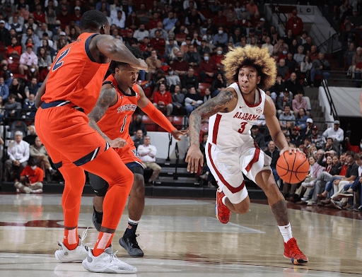 Alabama guard JD Davison (3) drives to the basket in Alabama’s 81-77 loss against Auburn on Jan. 11, 2022. 