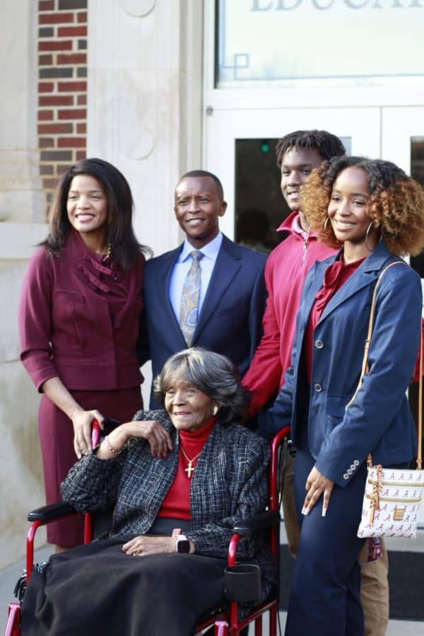 Alongside her family, Autherine Lucy receives her congressional record during the dedication of the newly named Lucy-Graves Hall in Tuscaloosa, Alabama on Feb. 25, 2022.