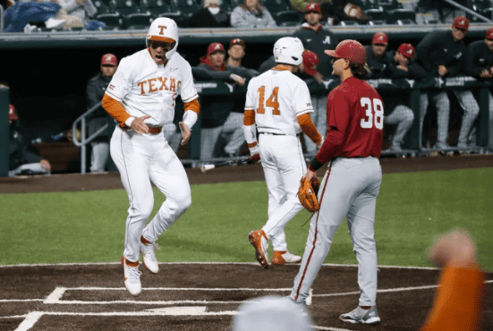 Texas third baseman Skyler Messinger scores the winning run in the Longhorn’s 1-0 win over Alabama Friday night. 