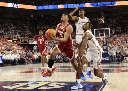 Jaden Shackelford (5) drives to the basket in Alabama’s 100-81 loss to No. 1 Auburn at Auburn Arena on Feb. 1, 2022.