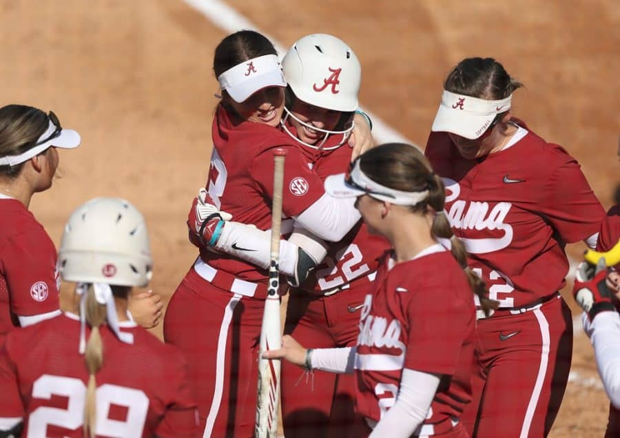 Alabama+freshman+Kali+Heivilin+%2822%29+is+embraced+by+her+teammates+after+hitting+her+first+collegiate+home+run+against+North+Alabama+on+April+19+at+Rhoads+Stadium+in+Tuscaloosa%2C+Alabama.
