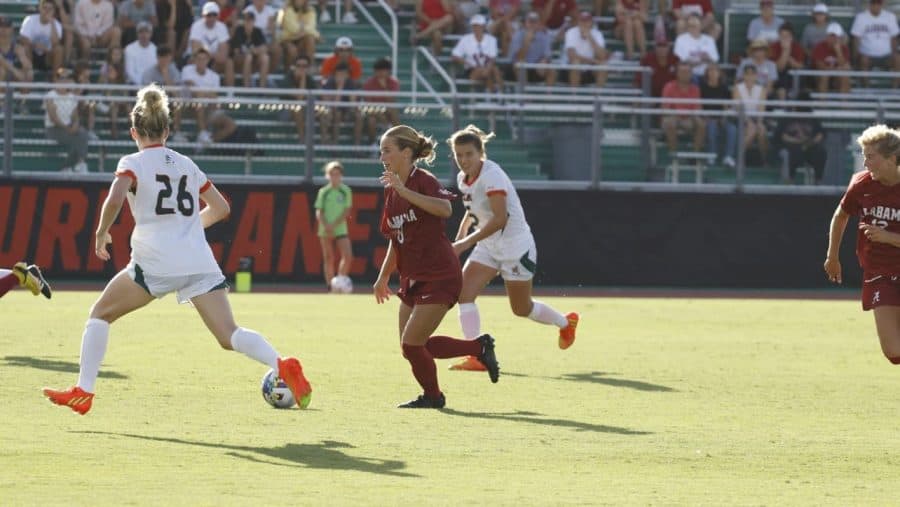 Alabama midfielder Felicia Knox (8) carries the ball up the field in the Crimson Tides 1-0 loss to the Miami Hurricanes on Aug. 21 at Cobb Stadium in Coral Gables, Fla.
