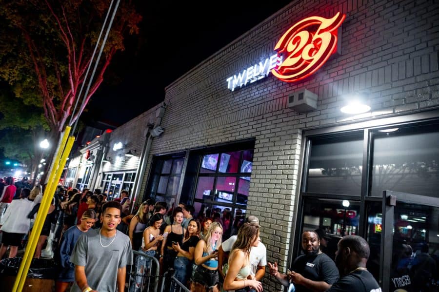 A crowd lines up to get into Twelve 25 on the Strip in Tuscaloosa, AL.