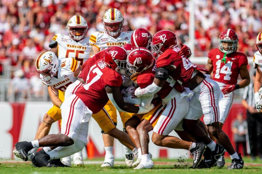 The Alabama defense suffocates the ballcarrier in the Crimson Tides 63-7 victory over the UL Monroe Warhawks on Sept. 17 at Bryant-Denny Stadium in Tuscaloosa, Ala.