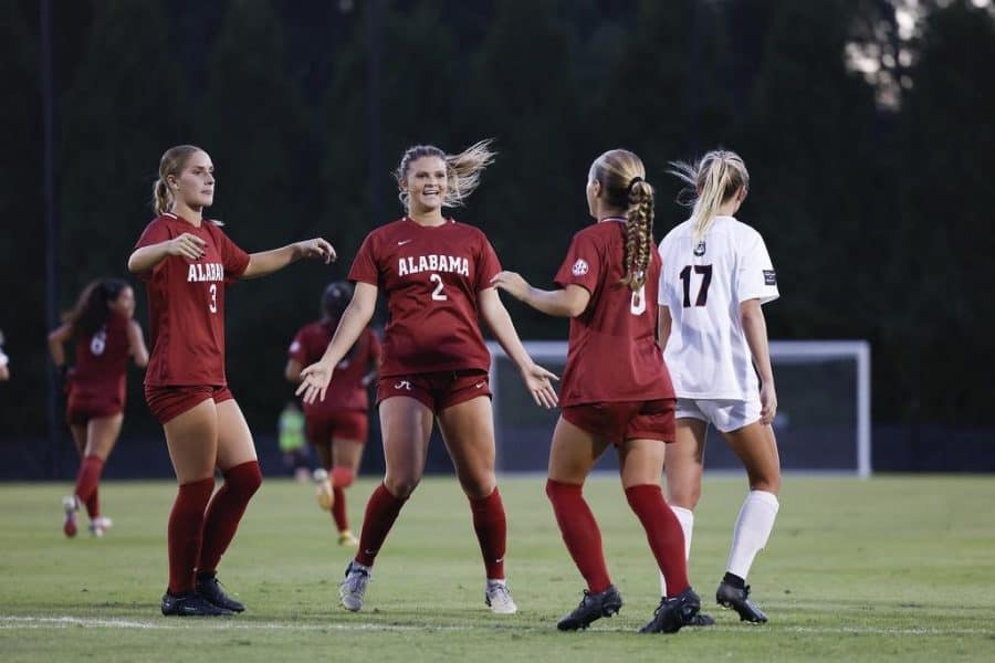 Alabamas Brooke Steere (3), Macy Clem (2) and Felicia Knox (8) celebrate in the Crimson Tides 2-1 win over the Georgia Bulldogs on Sept. 29 at Turner Field in Athens, Ga.