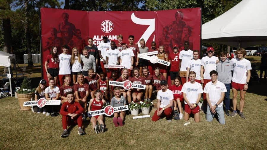 The Alabama cross country team poses for a picture following the Crimson Classic on Oct. 14 at the Harry Pritchett Running Course in Tuscaloosa, Ala.