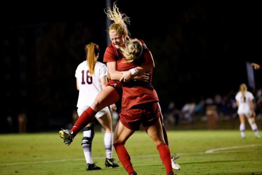 Alabama forwards Ashlynn Serepca (19) and Riley Mattingly Parker (10) celebrate a goal in the Crimson Tides 4-1 victory over the Mississippi State Bulldogs on Oct. 20 at the Mississippi State Soccer Field in Starkville, Miss.