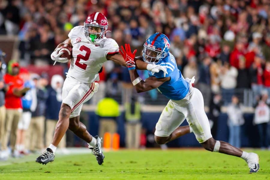 Alabama running back Jase McClellan (2) stiff arms an Ole Miss defender while on the way to a first down in the Crimson Tide’s 30-24 win over No. 11 Ole Miss on Nov. 12 at Vaught-Hemingway Stadium in Oxford, Miss.
