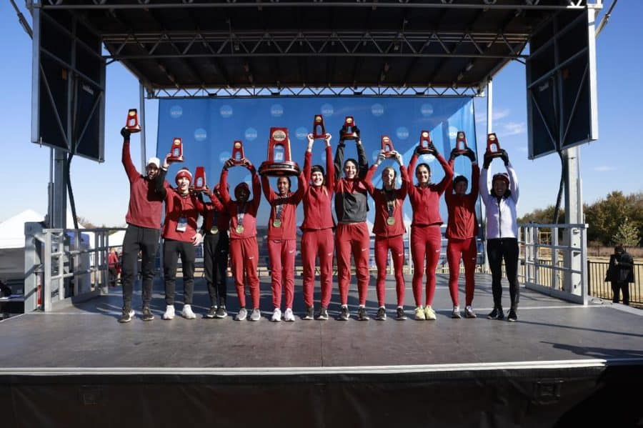 The Alabama womens cross country team poses with its hardware at the NCAA Championships on Nov. 19 at the Greiner Family Oklahoma State University Cross Country Course in Stillwater, Okla.