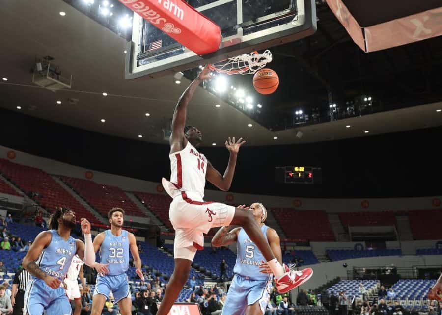 Alabamas Charles Bediako (14) throws it down in the Crimson Tides 103-101 four-overtime victory over the No. 1 North Carolina Tar Heels on Nov. 27 at Veterans Memorial Coliseum in Portland, Ore.