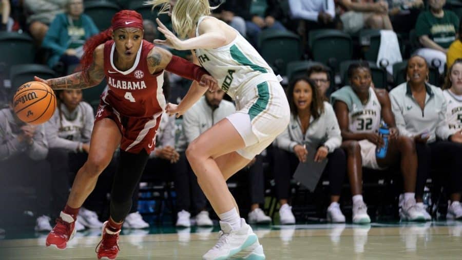 Alabama guard JaMya Mingo-Young (4) tries to drive past a defender in the Crimson Tides 67-59 loss to the South Florida Bulls on Nov. 16 at the Yuengling Center in Tampa, Fla.