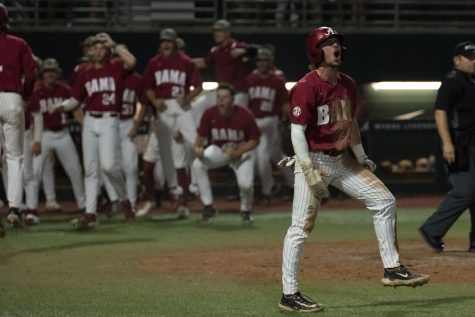 Alabama baseball team celebrates their win over Troy University on June 3 at Sewell-Thomas Stadium in Tuscaloosa, Ala.