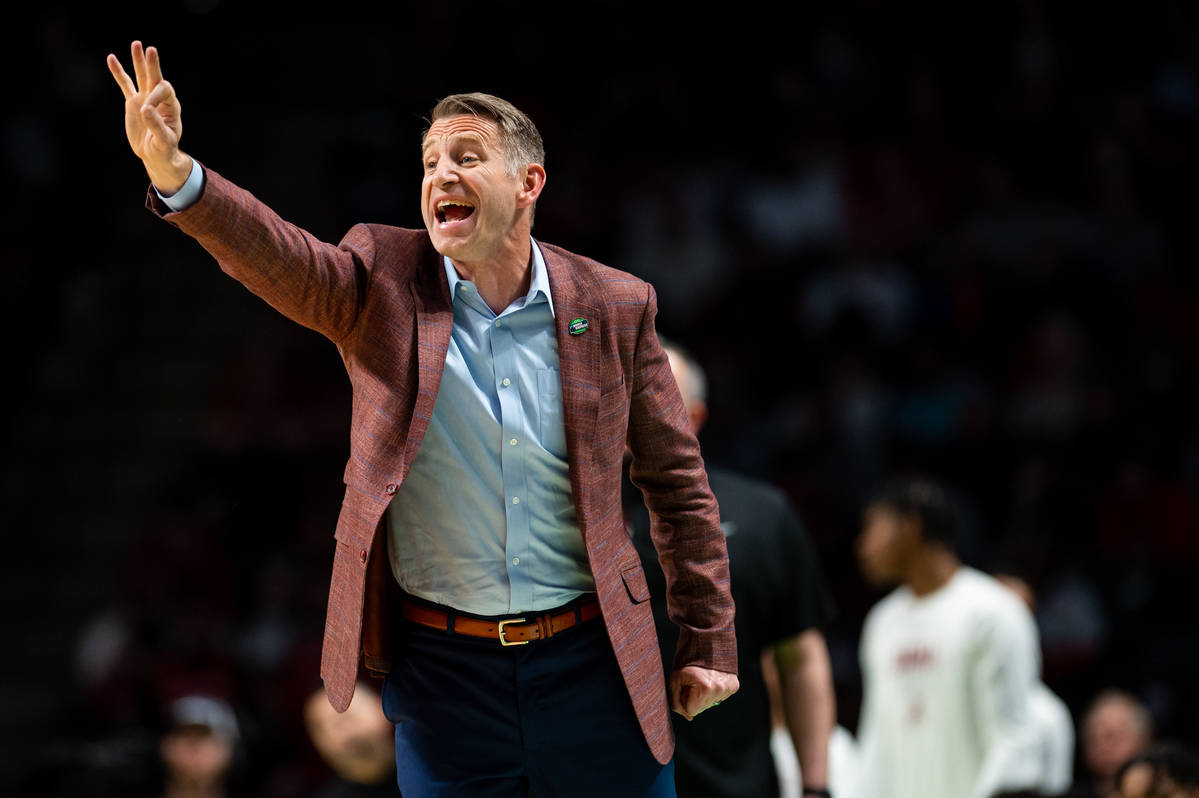 Alabama men’s basketball coach Nate Oats shouting from the sidelines in a game against Maryland during March Madness on March 18 at the Legacy Arena in Birmingham, Ala.