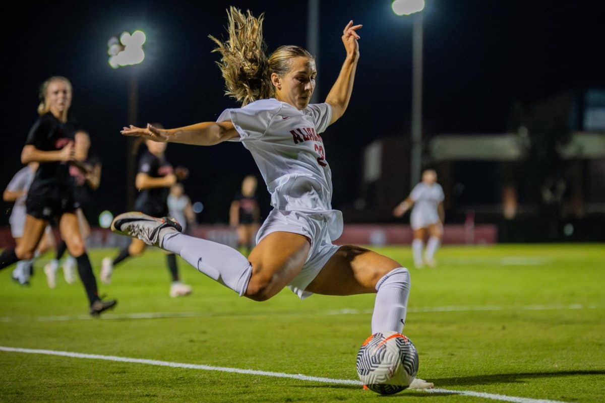 Alabama soccer player Leah Kunde (#22) prepares to kick the ball in a game against Georgia on Sep. 14 at the Alabama Soccer Stadium in Tuscaloosa, Ala.