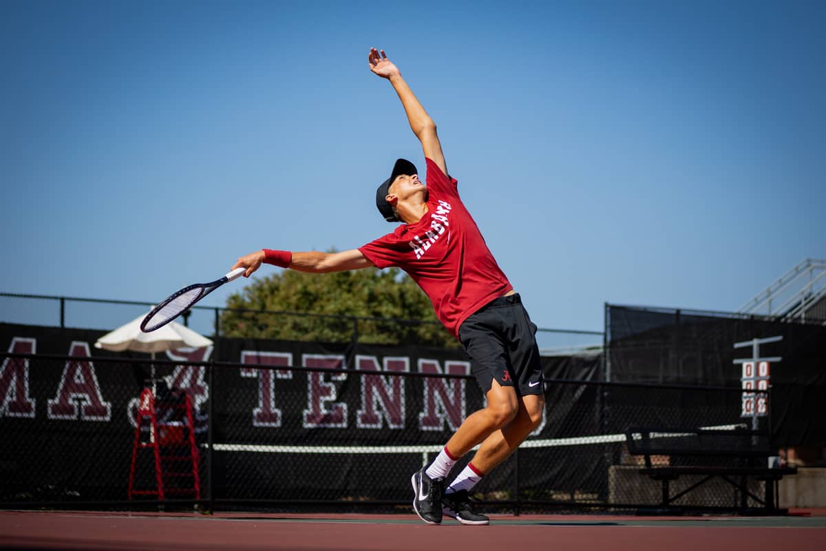 Alabama mens tennis player Andrii Zimnockh sets the ball during the Four in the Fall tournament on Sept. 29 at the Alabama Tennis Stadium in Tuscaloosa, Ala.