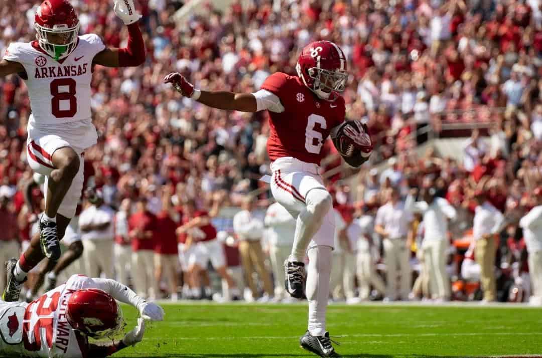 Alabama wide receiver Kobe Prentice (#6) runs the ball for a touchdown against Arkansas on Oct. 14 in Tuscaloosa, Ala.