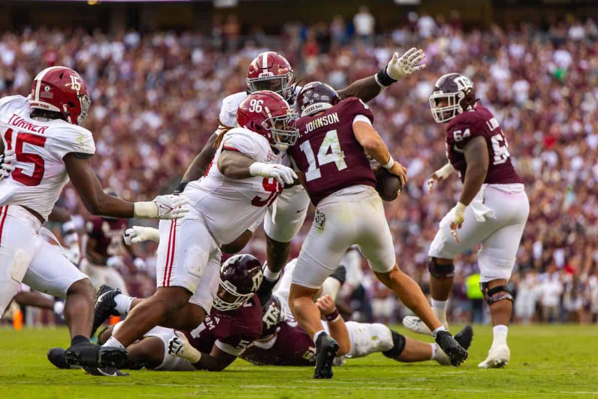 Alabama defensive lineman Tim Keenan III (#6) sacks the Texas A&M quarterback on Oct. 7 at Kyle Field in College Station, Texas.