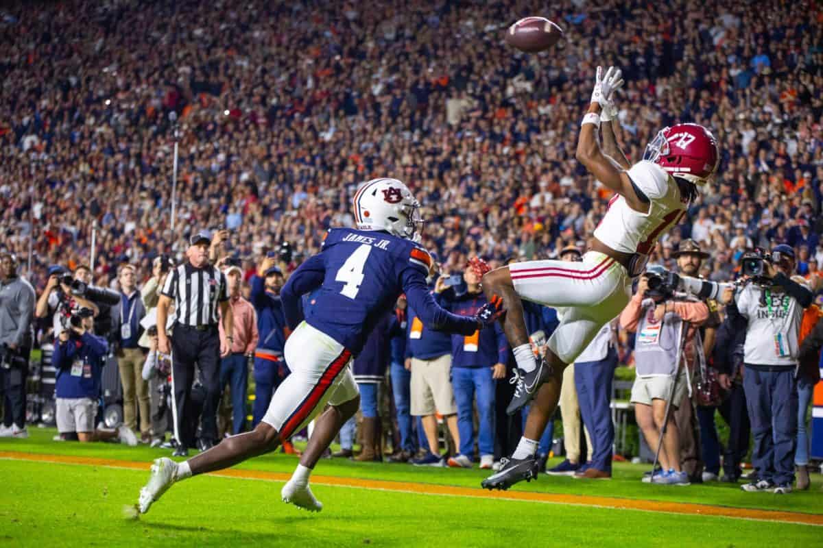 Alabama wide receiver Isaiah Bond (#17) jumps to make a catch for the touchdown that put Alabama in the lead over Auburn in the Iron Bowl.