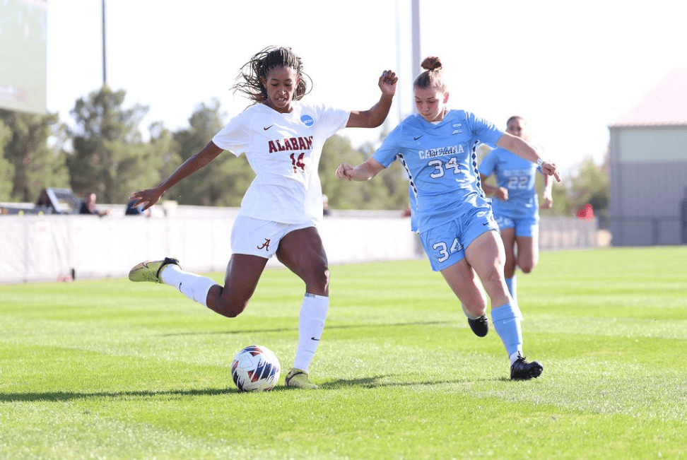 Alabama soccer player Gianna Paul (14) takes a shot against North Carolina at John Walker Soccer Complex in Lubbock, TX on Friday, Nov 17, 2023.