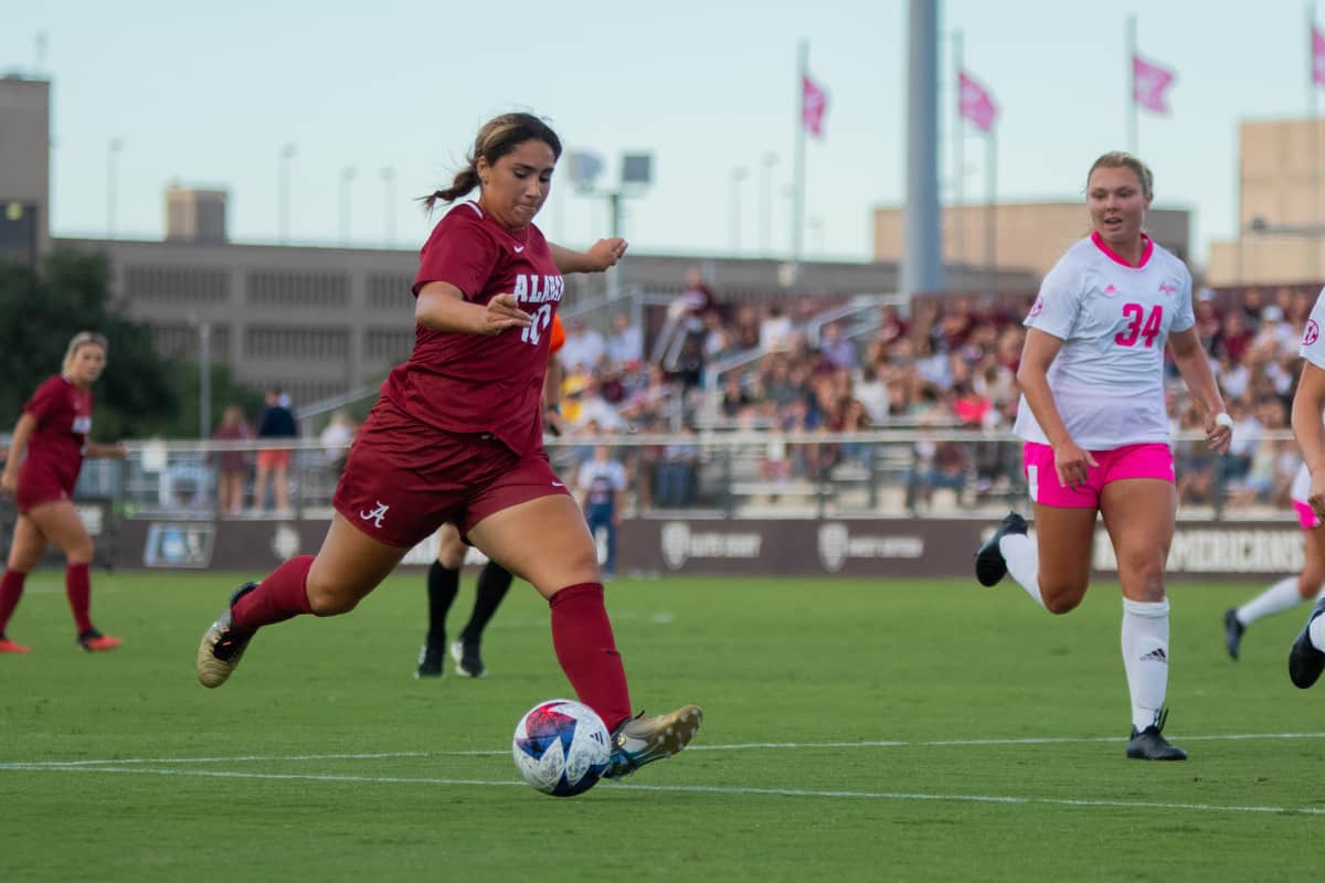  Alabama soccer player Nadia Ramadan (#10) kicks the ball downfield against Texas A&M on Oct. 8 on College Station, Texas.