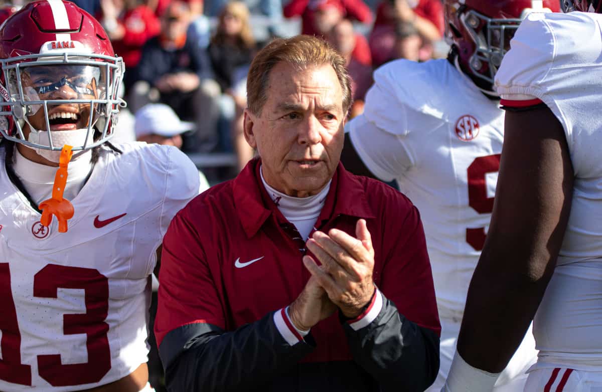 Alabama head football coach Nick Saban leads the players out to face Auburn in the Iron Bowl on Nov. 25 in Auburn, Ala.
