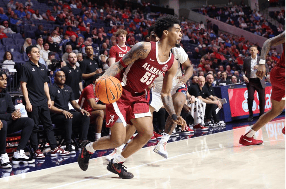Alabama guard Aaron Estrada (55) looks to pass the ball against Ole Miss at The Sandy and John Black Pavilion in Oxford, Mississippi on Wednesday, Feb 28, 2024.