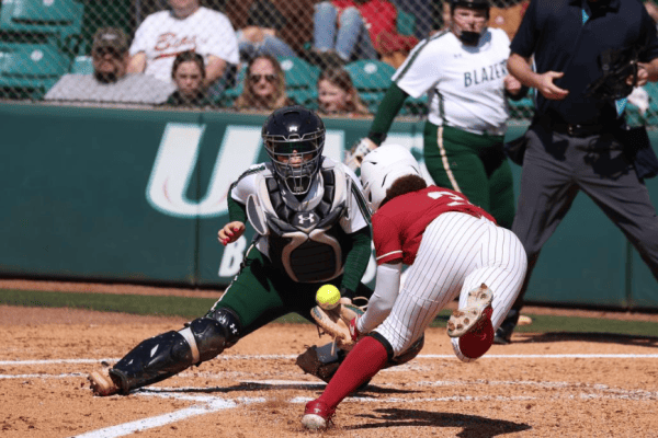 Alabama softball player Kristen White (3) slides into home against UAB at Mary Bowers Field in Birmingham, AL on Sunday, Feb 25, 2024.