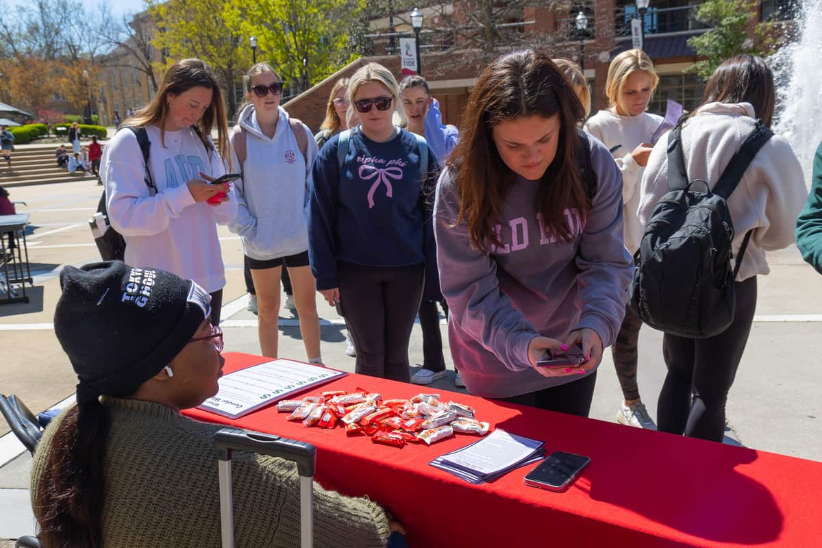 Students gather at a WGRC tabling event