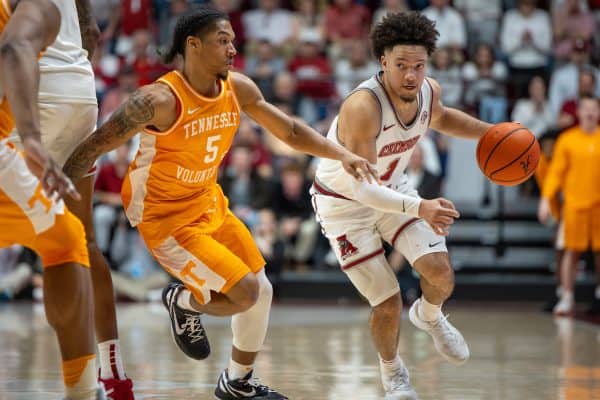 Alabama guard Mark Sears (#1) dribbles down the court against Tennessee.