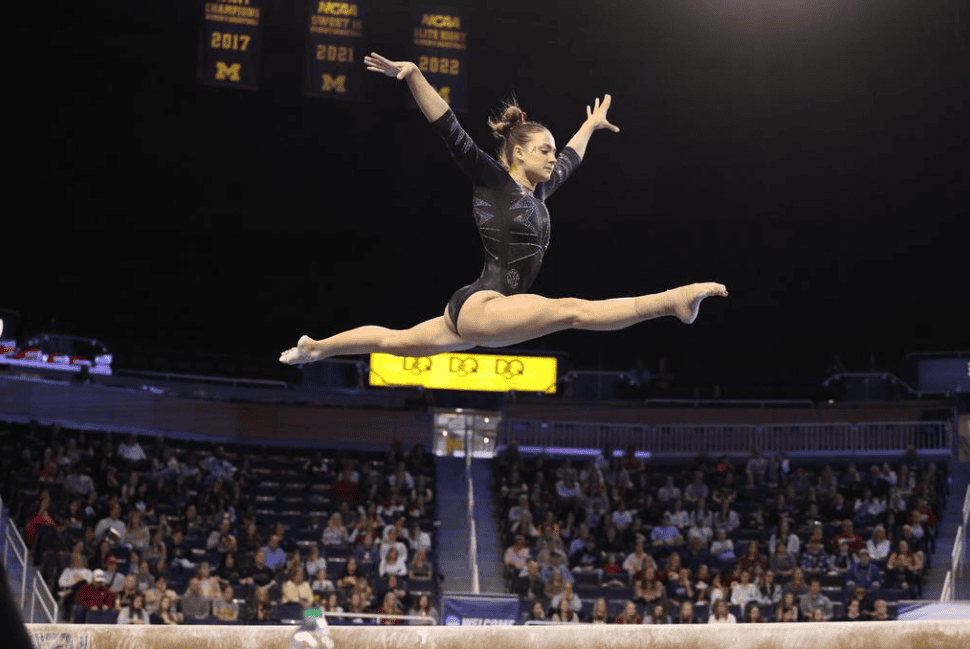 Alabama gymnast Gabby Gladieux jumps on the balance beam during the NCAA Regional Final at Crisler Center in Ann Arbor, MI on Saturday, Apr 6, 2024.