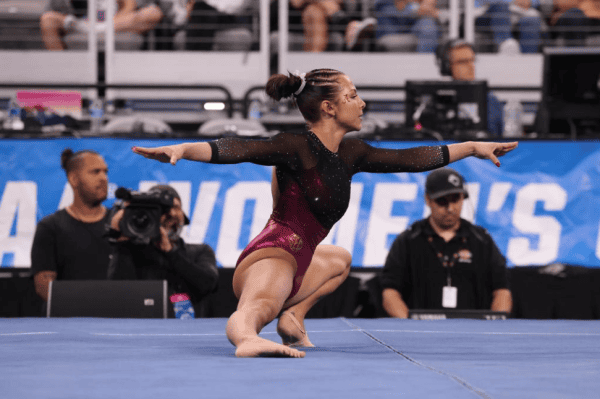 Alabama gymnast Cam Machado performs a wolf turn during the NCAA National Semifinal at Dickies Arena in Fort Worth, TX on Thursday, Apr 18, 2024.