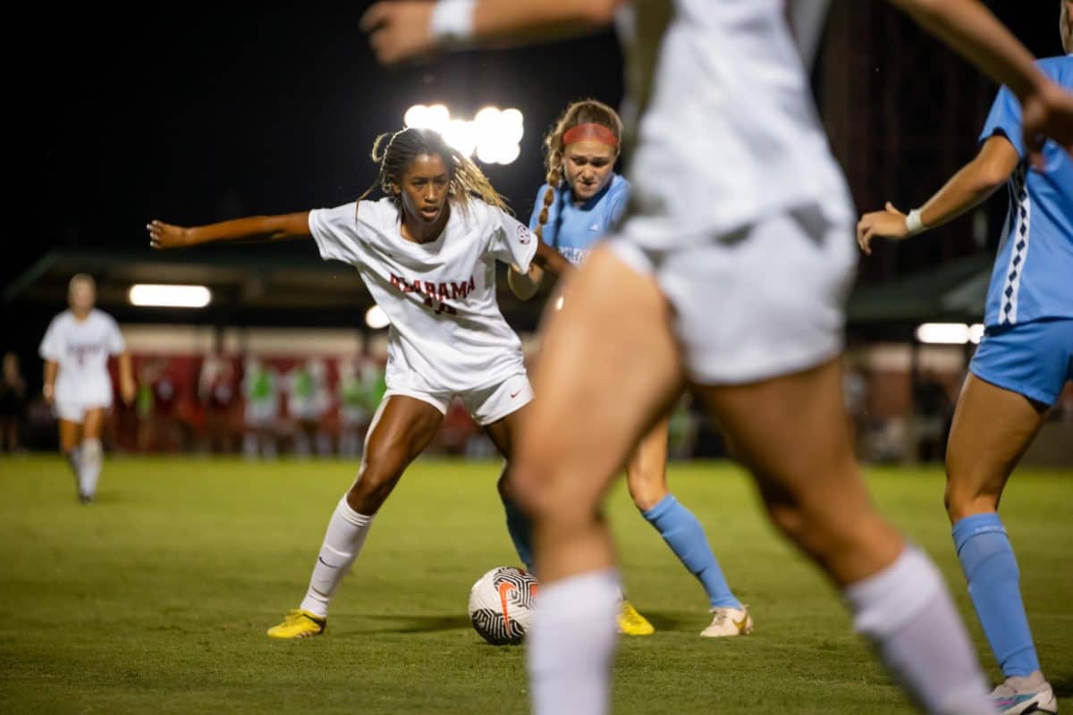 Womens soccer player Gianna Paul, who was named 2022 SEC Freshman of the Year, fights for the ball against North Carolina in September 2023. 