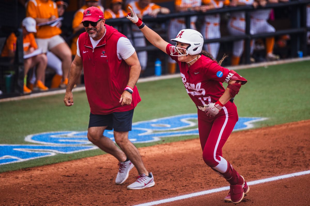 Alabama softball player Riley Valentine (#17) celebrates a grand slam against Tennessee in Knoxville, TN on Sunday, May 26, 2024.