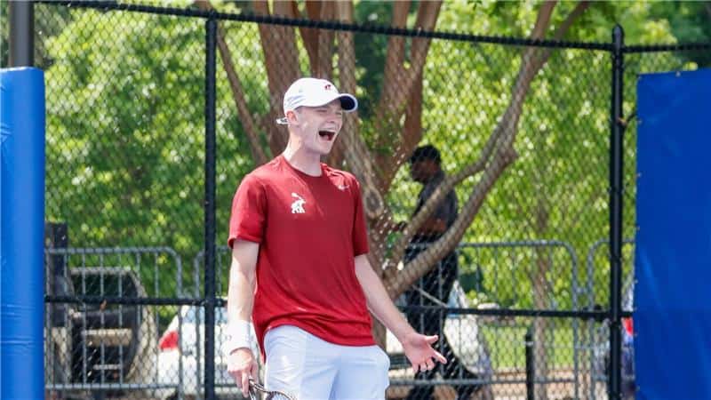 Alabama tennis player Roan Jones celebrates following the teams win in the first round over Charlotte.